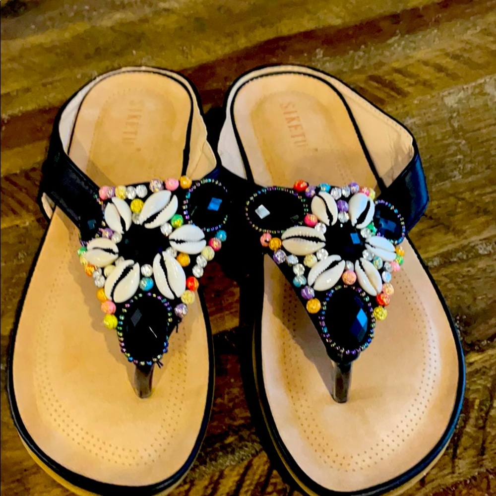 Sandals with shells and beads.